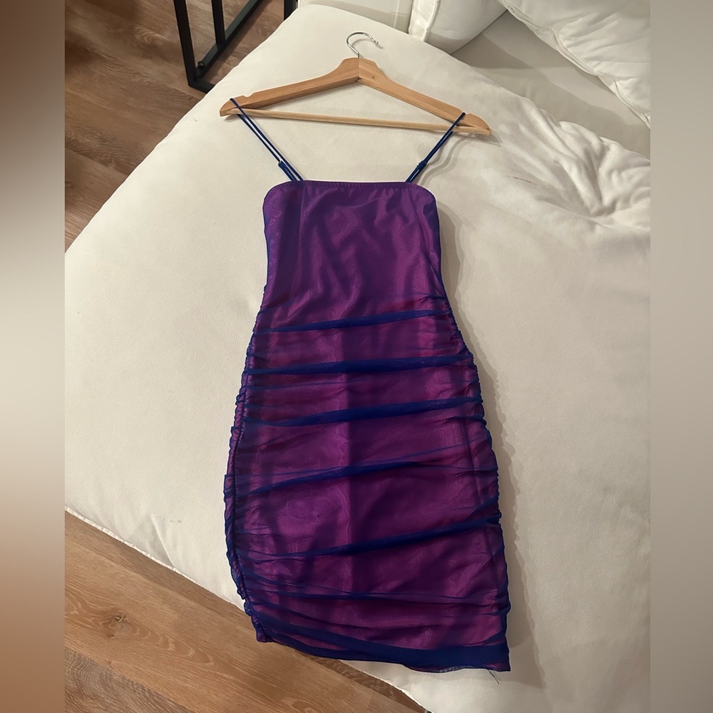 Pink and navy body on dress.